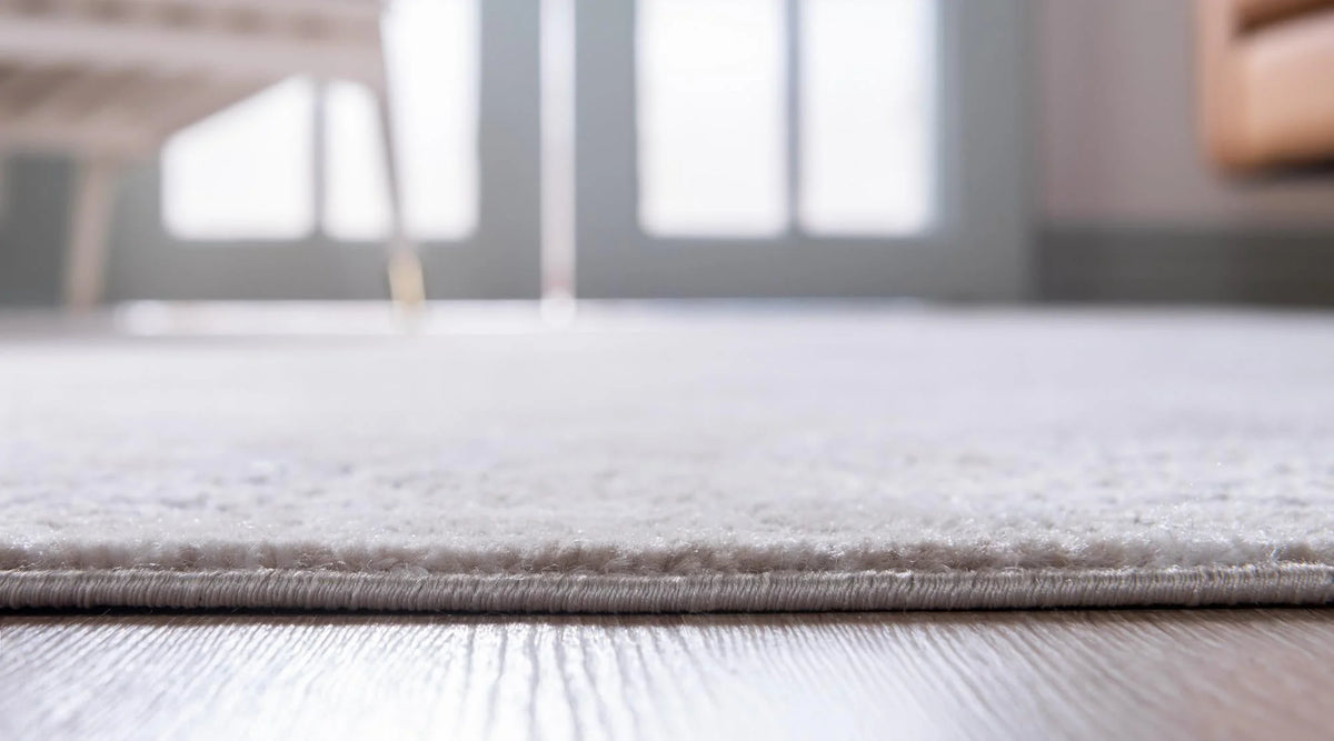 9' x 12' Ivory Low-Pile Rug C705